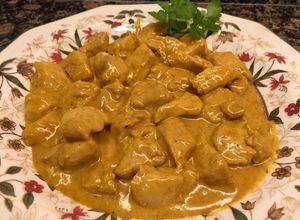 Una foto de Magro de pollo en salsa al curry