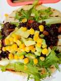 Fajitas messicane con riso nero e fagioli