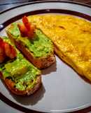 Omelette de salmón a las finas hierbas con costrinis de camarón