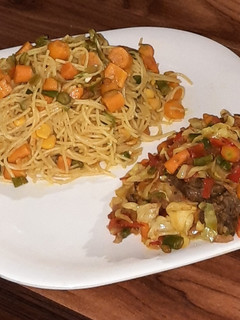A picture of Fried pasta with veggies sauce.