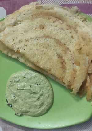A picture of Idli/Dosa Batter. Soyabean seeds Dosa & Green coconut chutney.