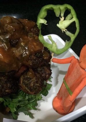A picture of Capsicum Manchurian With Stuff Noodles.