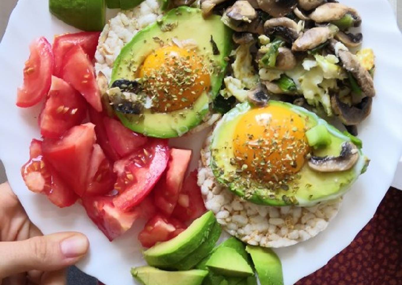 Eggs in avo with mushrooms and onion