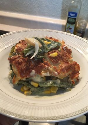 Una foto de “Lasaña” de papa con rajas y queso