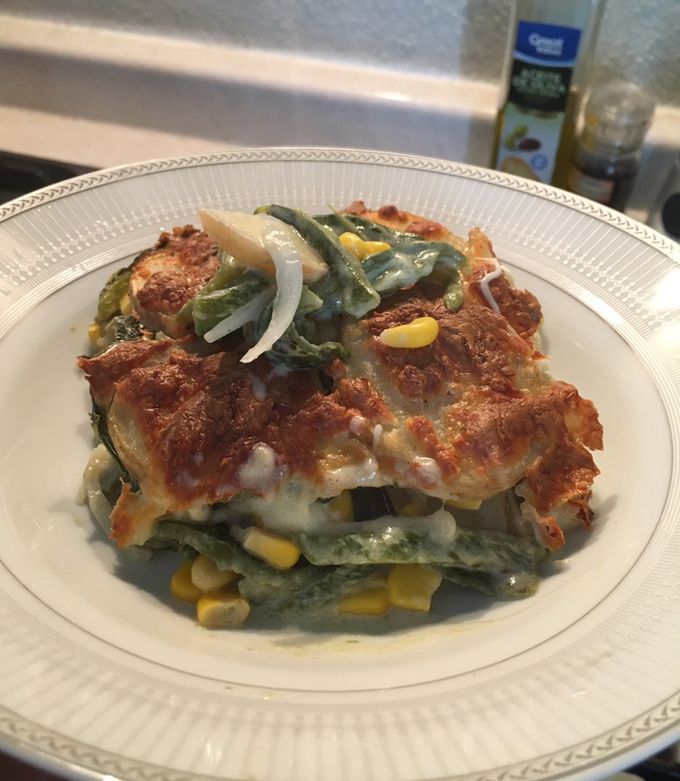 Una foto de “Lasaña” de papa con rajas y queso
