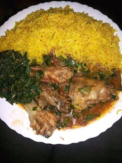 A picture of Chicken stew and rice.