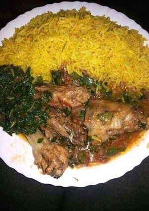 A picture of Chicken stew and rice.