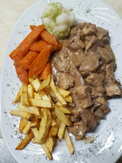 Una foto de Pollo al oporto