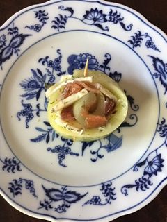 A picture of California Farm Cured Salmon Cucumber Cheese Rolls.