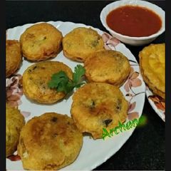 A picture of Fresh mix herbs aloo chop 😋😋.