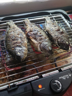 Una foto de Tilapia asada