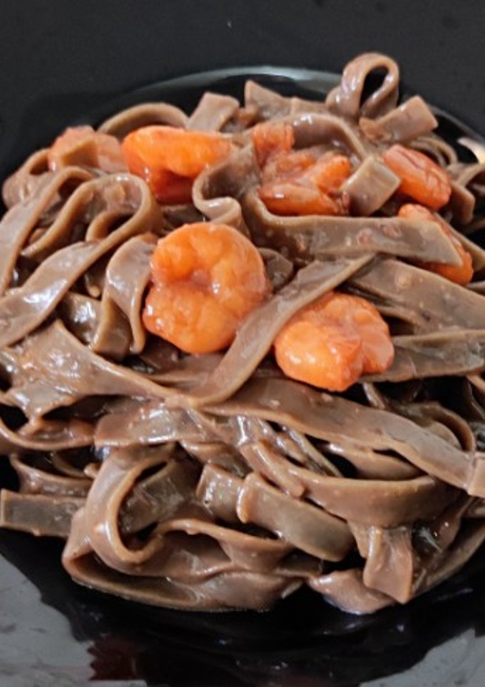 Una foto de Pasta "Tagliatelle al nero di seppia"
