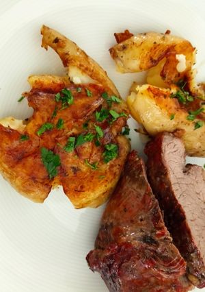 Una foto de Papas aplastadas