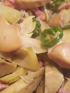 Una foto de Alcachofas con foie al vino blanco