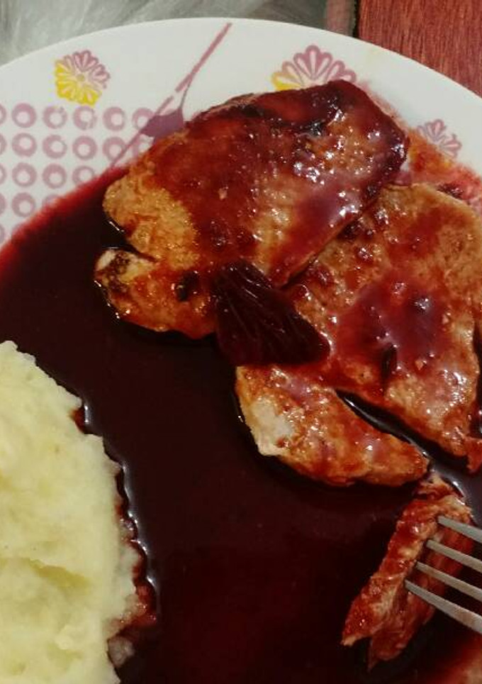 Una foto de Lomo de cerdo en salsa de Jamaica