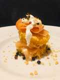 Torre di zucca gialla e salmone