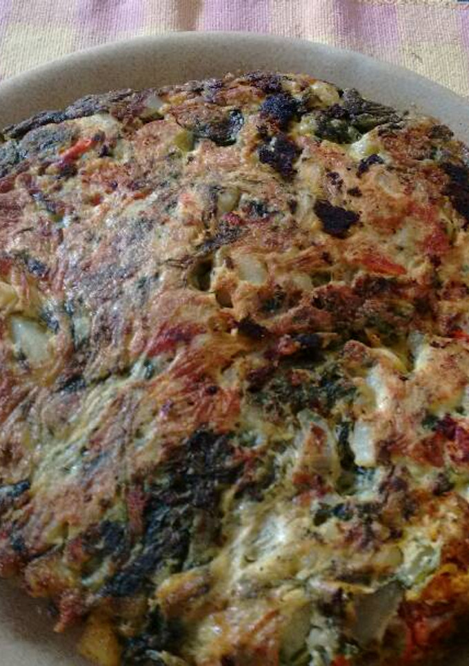 Una foto de Tortilla de patatas y acelgas. ॐ