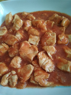 Una foto de Magro de pollo con tomate