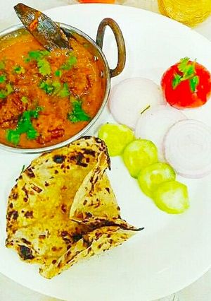 A picture of Lauki balls in chettinad gravy.