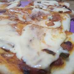 Una foto de 🍕Pizza con salsa casera fácil 🍕