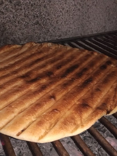 Una foto de Tortilla a la parrilla. (Bien santiagueña)