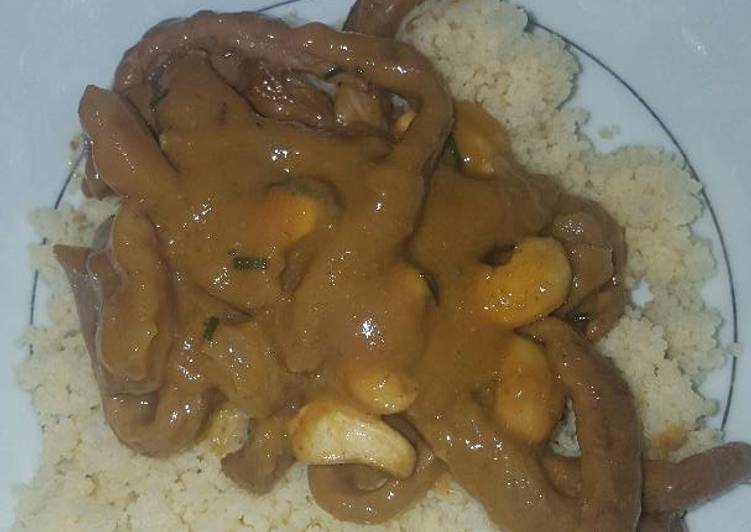 Creamy peanut sauce with beef strips and cous cous