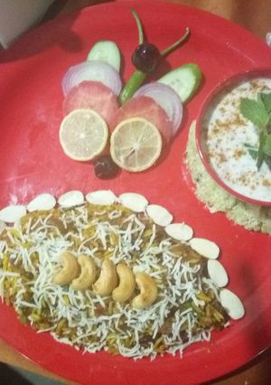 A picture of Biryani & veg raita.