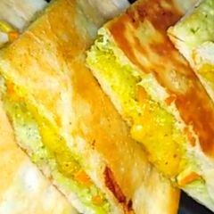 Cheesy pita pockets A picture of Cheesy pita pockets.