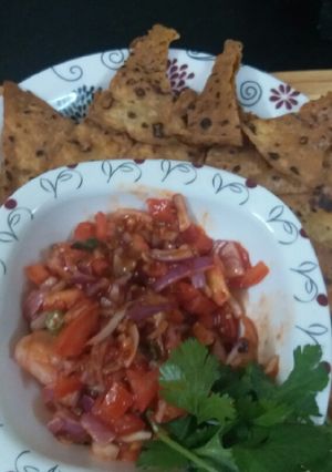 A picture of Roti nachos with instant salsa.
