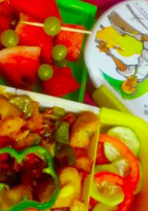 A picture of Khatta Dhokla with veg tadka.