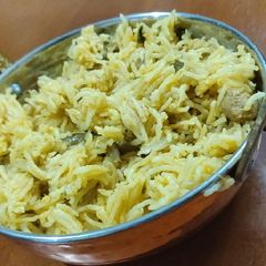 A picture of Thengaipaal Kathirikai Rice/coconut milk brinjal rice.