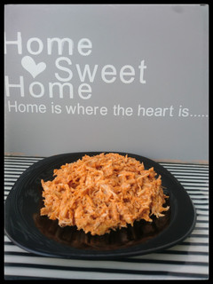 Una foto de Pulled chicken