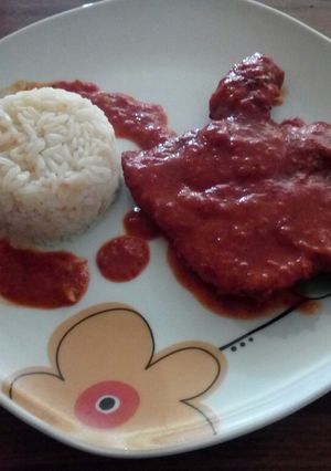 Una foto de Chuleta de cerdo con arroz