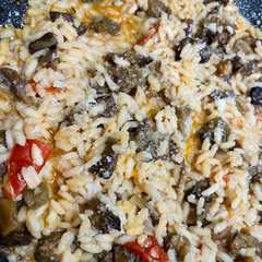 Una foto de #668 Risotto con melanzane a funghetto 🍆🍅🌱