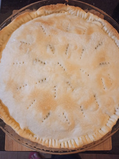Una foto de Tarta de cebolla, panceta y queso