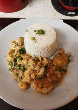A picture of My Garlic Seared Scallops and Fish medley. 😘.