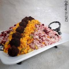 Persian Albaloo Polo (Sour Cherry Rice) A picture of Persian Albaloo Polo (Sour Cherry Rice).
