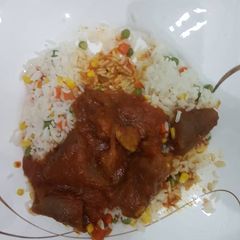 Stew and boiled rice with mixed vegetables A picture of Stew and boiled rice with mixed vegetables.