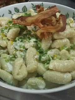 Una foto de Ñoquis de batata/camote y ricota