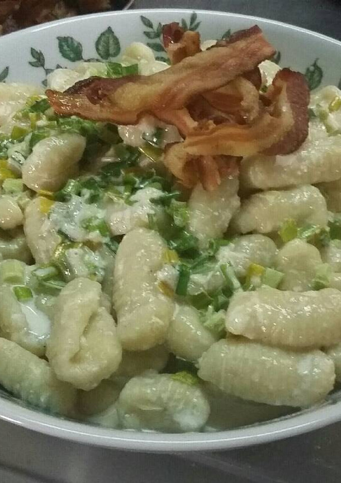 Una foto de Ñoquis de batata/camote y ricota