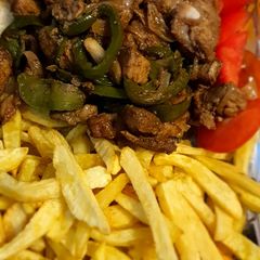 A picture of Pork & fries.