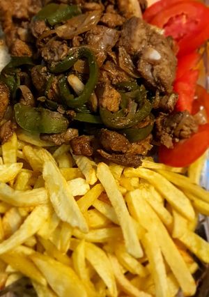 A picture of Pork & fries.