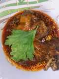 Pollo guisado con azúcar
