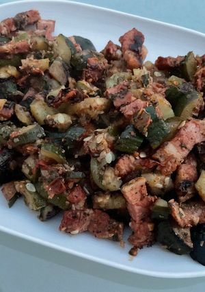 Une photo de Courgettes et tomates au lard et persil