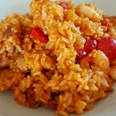 A picture of Chicken, chorizo and prawn paella.