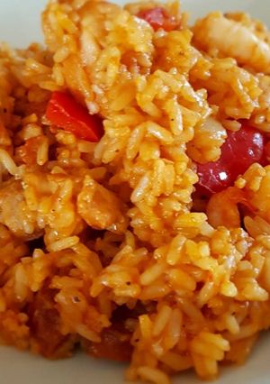 A picture of Chicken, chorizo and prawn paella.