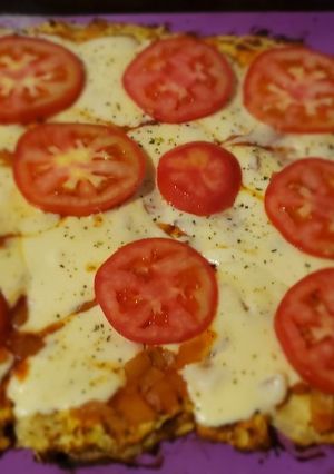 Una foto de Pizza con masa de pollo
