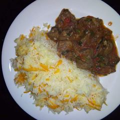A picture of Wet fried Beef with Carrot Rice.