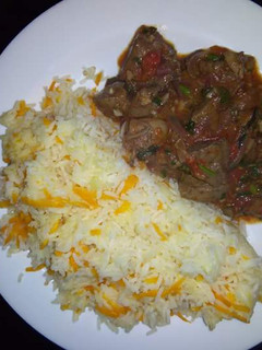 A picture of Wet fried Beef with Carrot Rice.