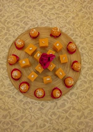 A picture of Almond & kaju low calories ladoo & barfi.